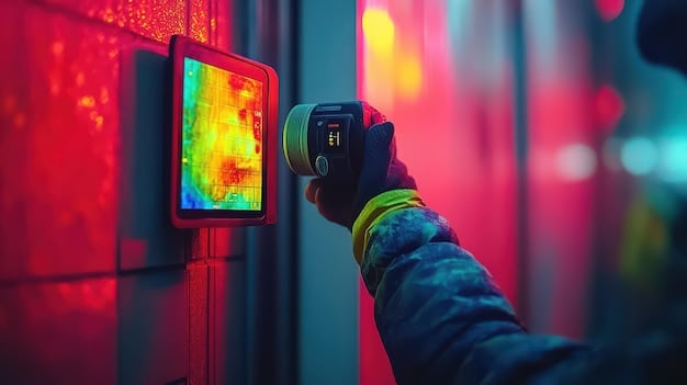A technician using a thermal imaging camera to identify heat loss in a commercial building, highlighting the importance of energy audits for businesses. The technician is wearing safety gear, and the camera display shows a heatmap of energy leakage.