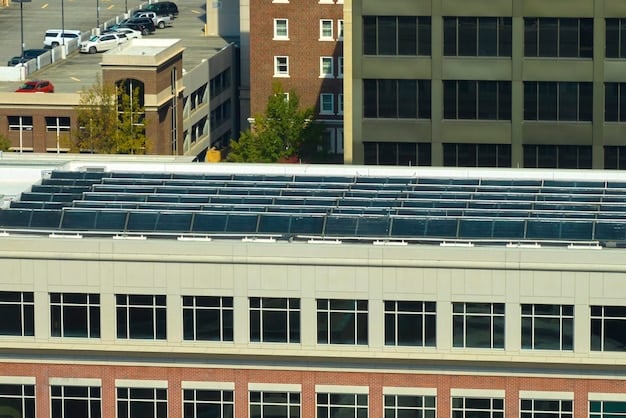 A large commercial rooftop covered in solar panels, capturing sunlight and generating renewable energy for the business. The background shows a cityscape with clear skies, emphasizing the potential for widespread adoption of solar power.