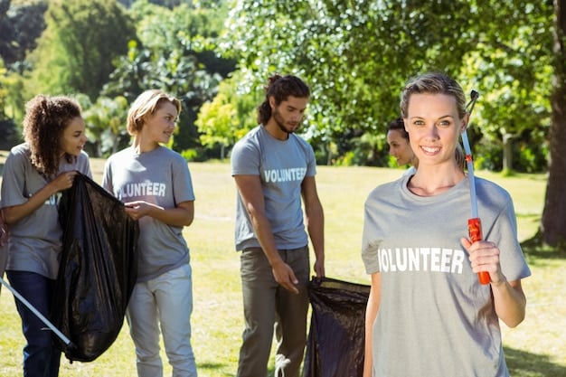 A group of employees participating in a community cleanup event wearing company branded t-shirts. The image showcases the company's commitment to social responsibility and environmental stewardship in a local community setting.