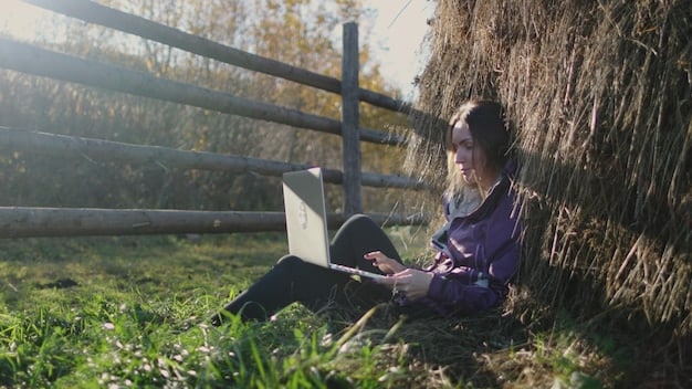 A young student in a rural area using a laptop with a Starlink connection, showcasing the educational opportunities that high-speed internet brings to underserved communities.
