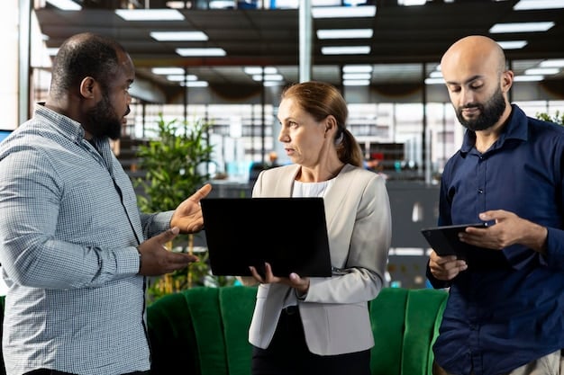 A diverse team of professionals collaborating in a modern office space, using advanced software and data analytics tools to optimize workforce management and resource allocation.