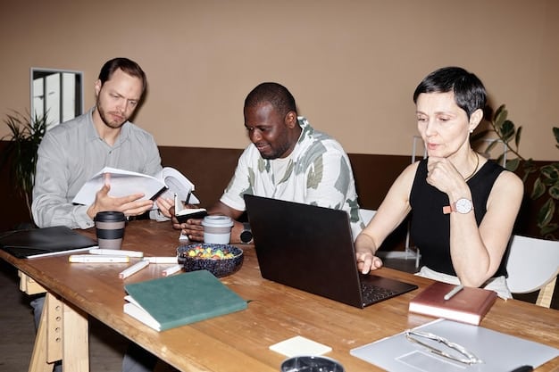 A diverse group of employees collaborating around a table with laptops and documents, while a whiteboard in the background displays a flow chart illustrating a circular economy model with arrows indicating resource flow and waste reduction strategies.