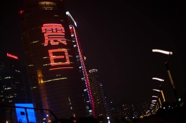 A bustling street scene in a modern Chinese city at night, with glowing neon signs and digital billboards displaying futuristic tech products, representing China's rapid technological advancement and urban innovation.